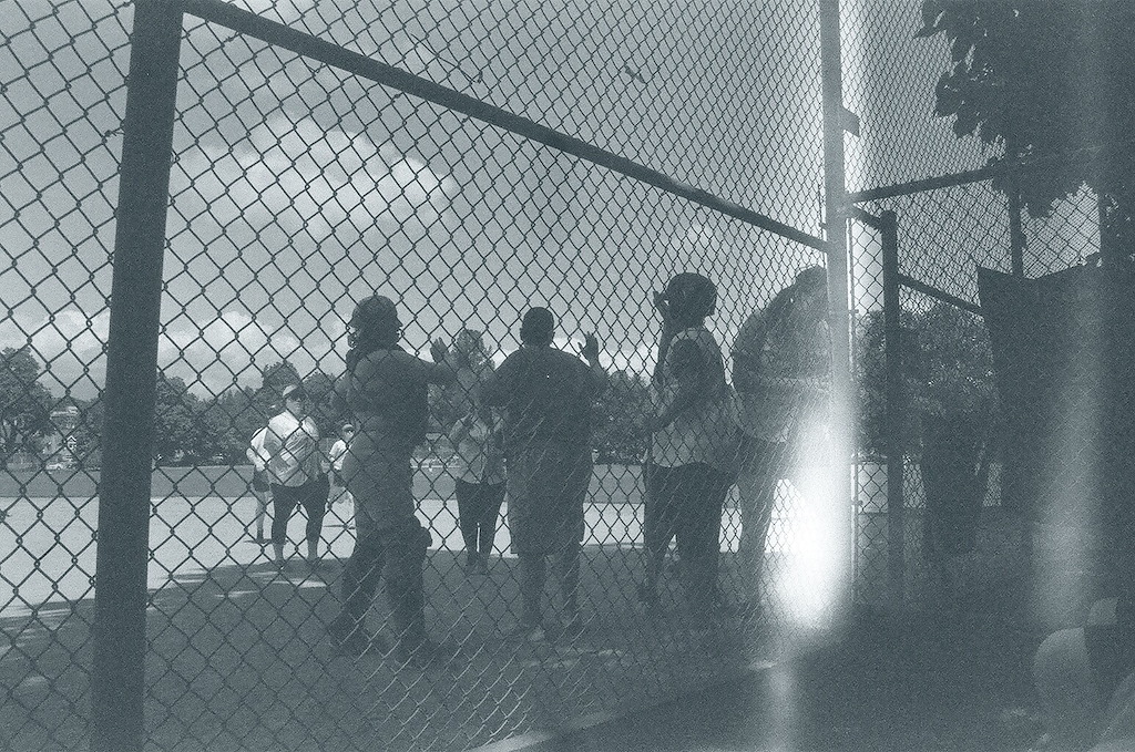 Teammates coming in after an inning is over.